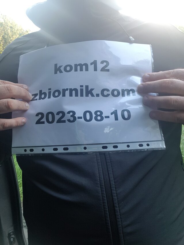 kom12