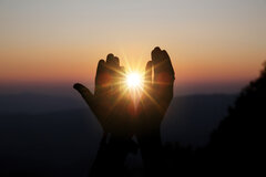 spiritual-prayer-hands-sun-shine-with-blurred-beautiful-sunset.j